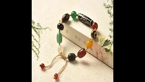 TIBETAN NINE EYE DZI BEAD AGATE WEALTH PROTECTION BRACELET