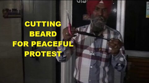 Sikh man cuts his Beard in front of the media