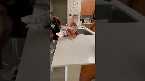 Baby does Ultimate Bottle Flip.