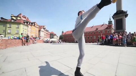 Man in Roller Blades Performing Infront of the People