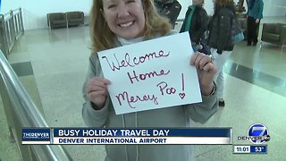 Busy holiday travel day at DIA
