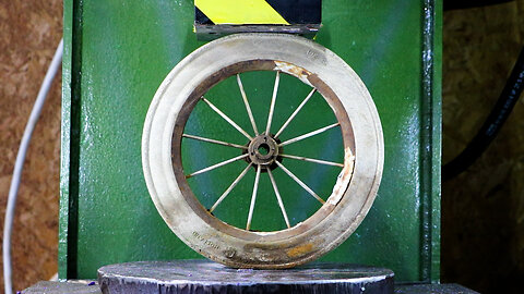 Wheel vs. Hydraulic Press