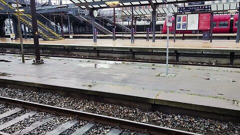 Rain over empty platforms at Copenhagen Central Station