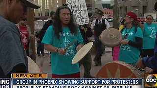 People hold North Dakota Access Pipeline protest in downtown Phoenix