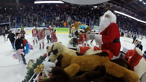 Santa gathers up teddy bears for orphans with Zamboni