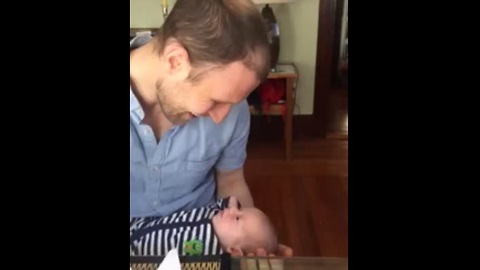 Newborn baby adorably spoils the moment