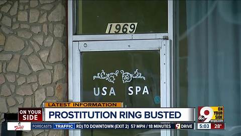 Four charged with prostitution in massage parlor raid
