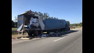 Truck driver crashes into stationary truck