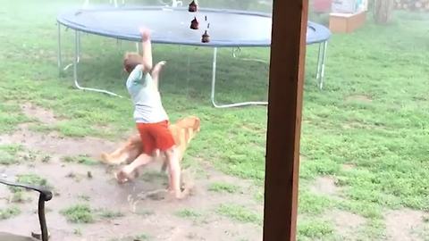 Kid Races Into Monsoon To Jump On Trampoline