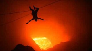 Tourists zipline over active volcano!