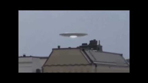 001 - UFO captured above unknown city