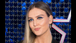 Little Mix's Perrie Edwards suffers tear in base of spine