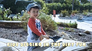 Little Boy Digging in the Dirt with Shovel Fun