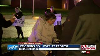 Protesters gather outside President Trump's rally in Council Bluffs