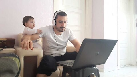 Baby Distracts Dad From Working From Home (Baby Distracts )