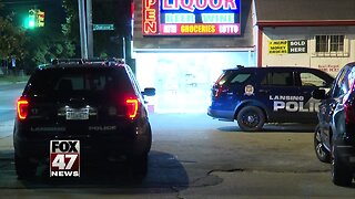 Liquor store robbed at gunpoint in Lansing