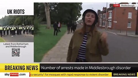 The Lying Media talks about White riots as Muslims walk by with machetes