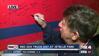 Longtime Red Sox fan signs team truck for first time
