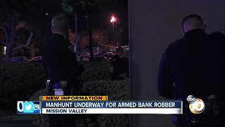 manhunt undeerway for armed bank robber
