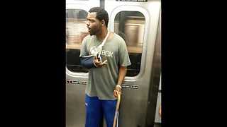 Dude on NY subway freestyles for passengers