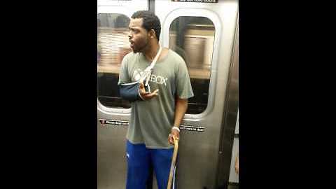 Dude on NY subway freestyles for passengers