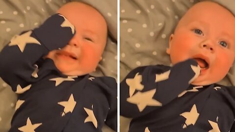 Dad puts baby's onesie on completely backwards