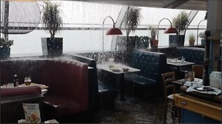 Flood at Luton Airport - heavy rain burst through ceiling!