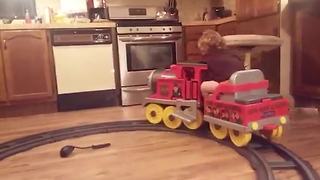 Toddler Boy Falls Asleep On A Toy Train