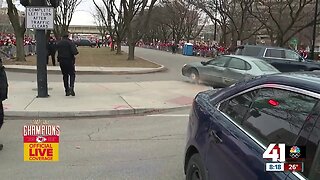 Police chase down parade route