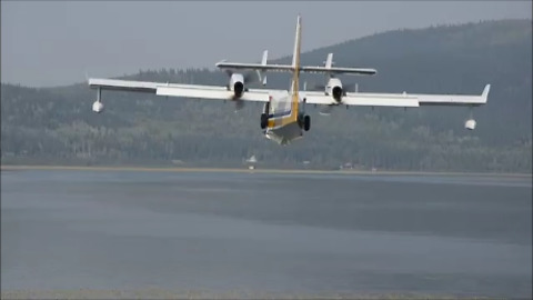 Water Scooping Planes Skim Lake to Fight Fire