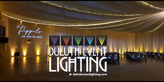 Wedding lighting in soft gold at the Eveleth Curling Club