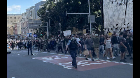 Sydney CBD Full Clip of Thousands Marching, Police Horse Parade, Riot squad, Police busses.