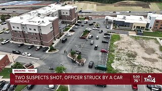 Officer rammed against car, 2 suspects shot by cop, police chief says