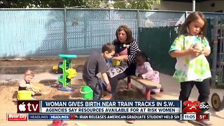 Woman gives birth on railroad tracks