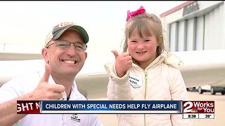 Kids with special needs get to fly in plane