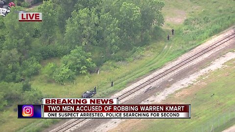 2 men accused of robbing Warren Kmart