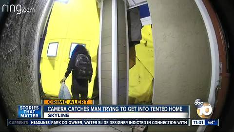 Camera catches man trying to get into tented home