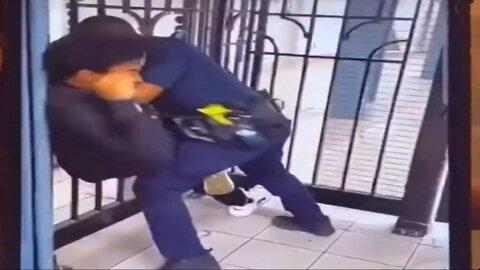 Black police officer desperately tries to subdue black teenager that has his face covered in blood