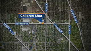 Police: 2 children shot inside car