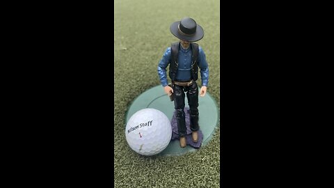 Golf is different for a tiny cowboy