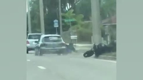 Car runs motorcyclist off road in Sarasota