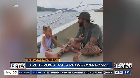 Girl throws dad's phone overboard