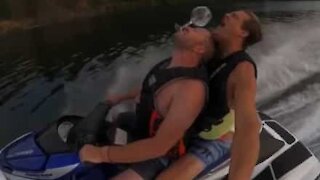 Buddies undertake "wine challenge" on jet ski!