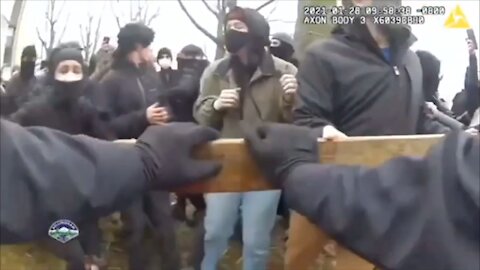 Bellingham PD body cam video of antifa attacking/spitting on officers 1-28-2021