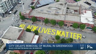 City delays removal of mural in Greenwood