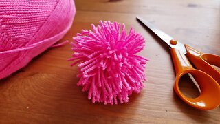 How to make a pom pom using your hand.