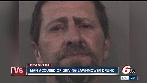 Man accused of driving a lawn mower onto a neighbor's property while intoxicated