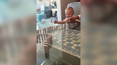 Grandpa gets Grandson Laughing with Dominoes