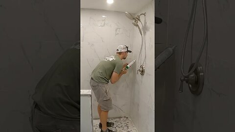 Adding Stainless Steel Corner Shelves to a New Shower | #shorts