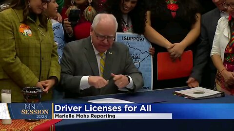 Tim Walz signing a law that provides drivers license for illegal aliens in Minnesota